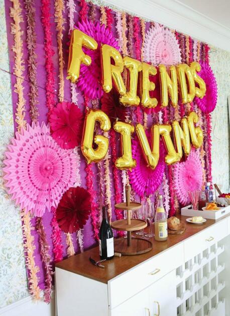 Friendsgiving party supplies in shades of pink