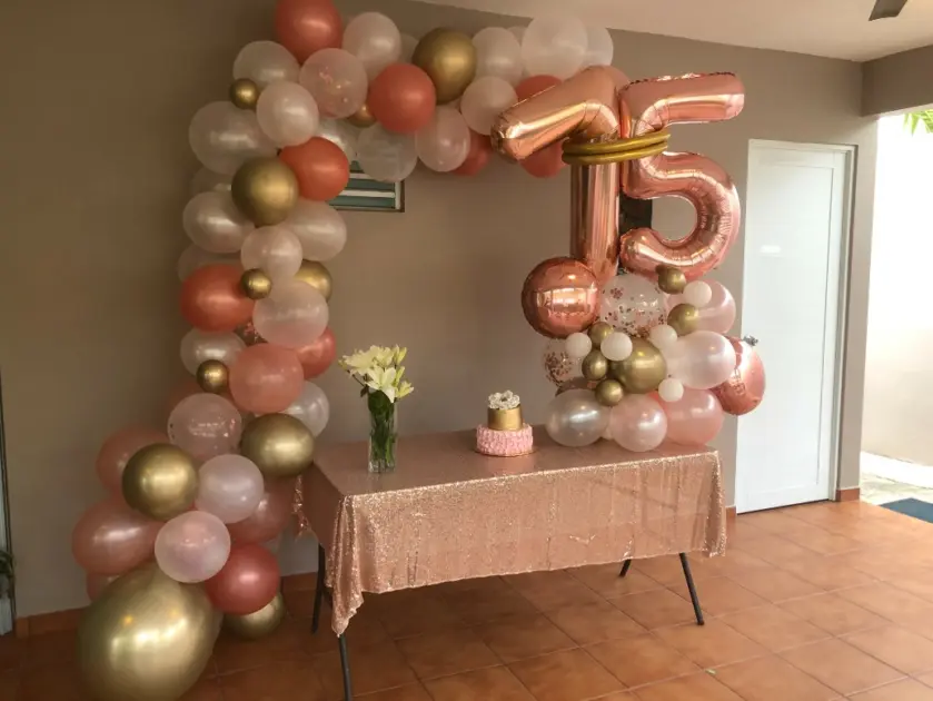party balloons rose gold arch decor