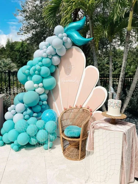 Little Mermaid Birthday Party Photo Backdrop With Ballons Shaped Like Mermaid