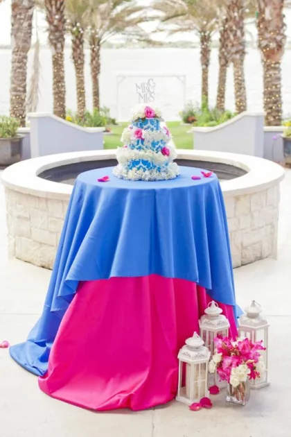 Mamma Mia Birthday Party Cake Round Table With Blue And Pink Tablecloth