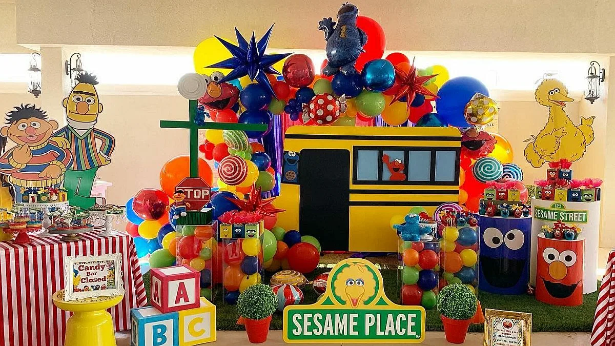 Sesame Street Birthday Party Bus Design Backdrop With Balloons And Cut Out Characters