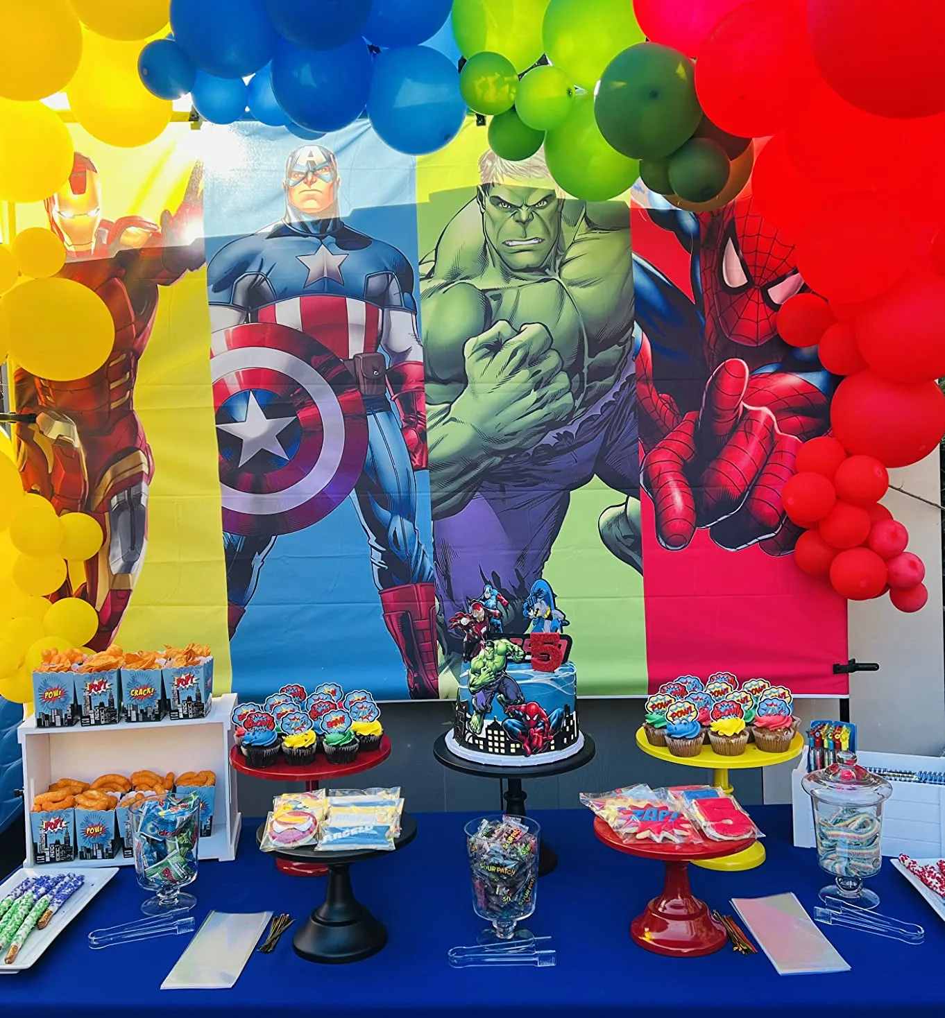Colorful Banner 5 Cake Topper Blue Tablecloth Angle View Avengers Birthday Party